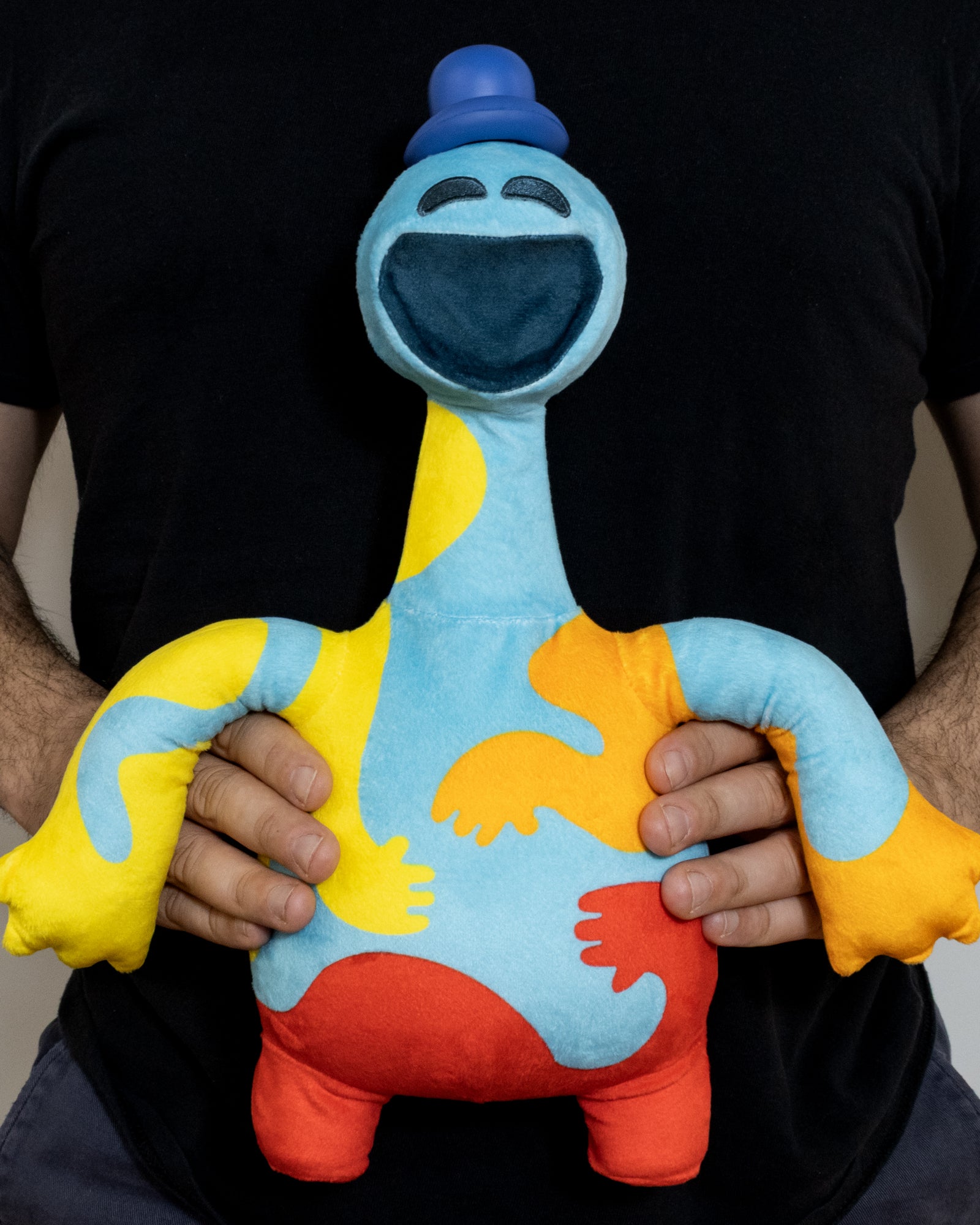 doey the doughman plush being held. 14 inch plush.