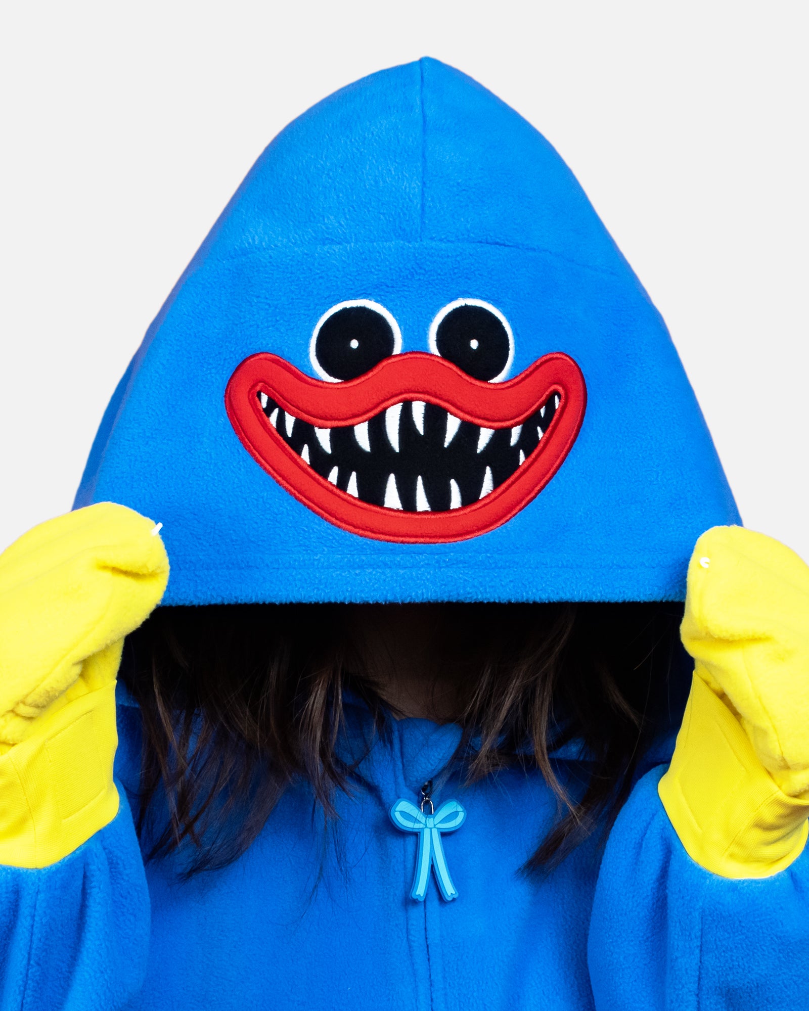 close up of hood on onesie. scary huggy wuggy smile.