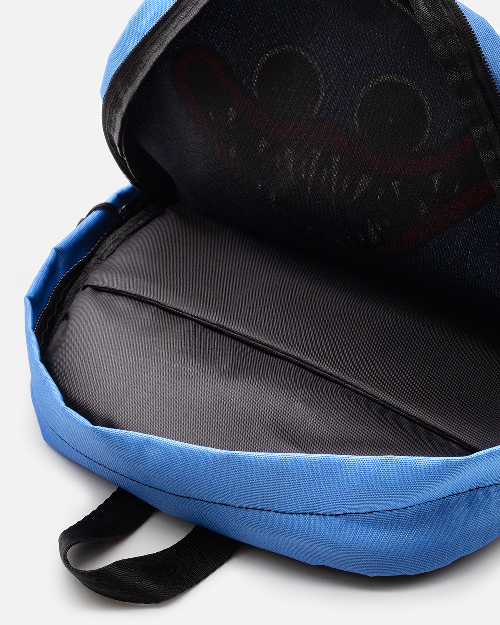 inside of huggy wuggy face backpack. big pocket on back.