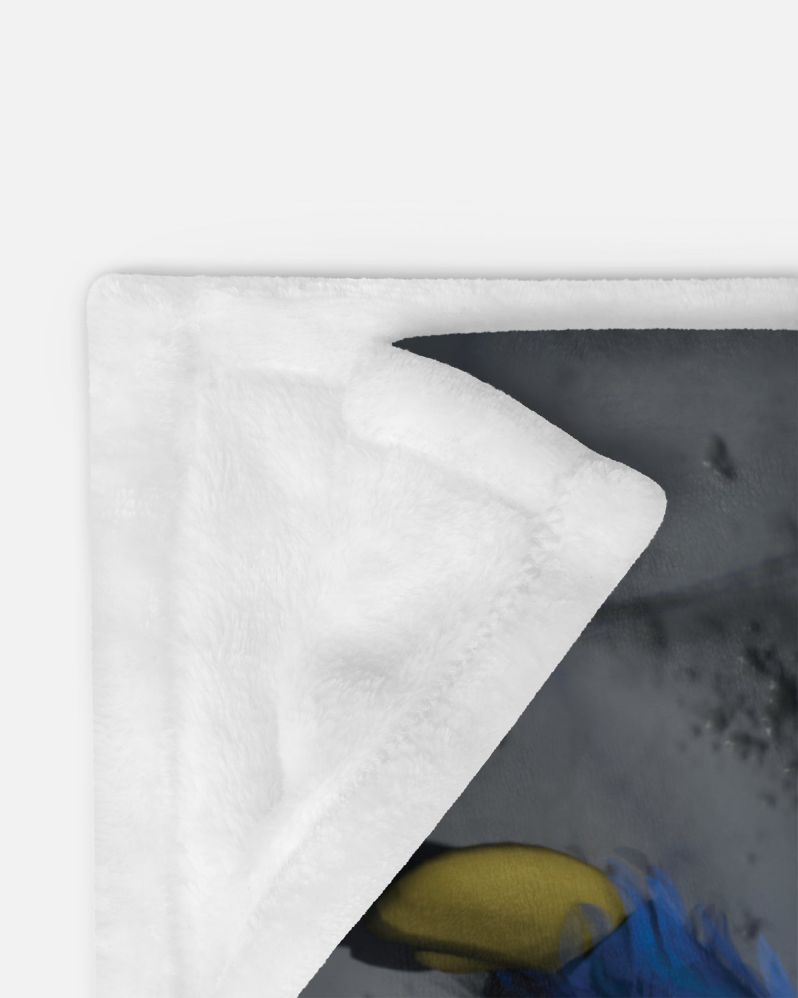 smiling huggy wuggy blanket showing underside. soft material.