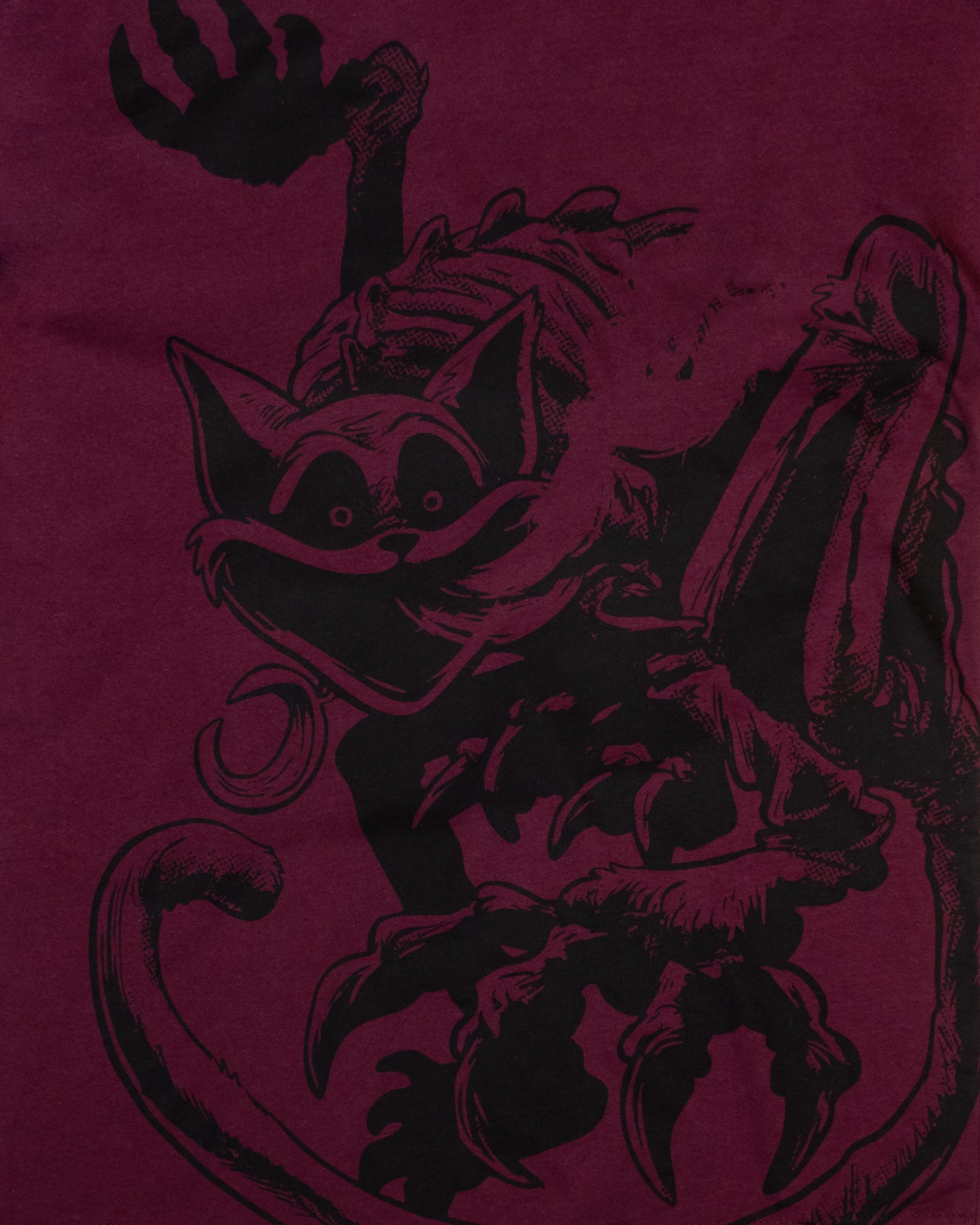 image on shirt: monster catnap posed. smoke coming out of mouth.