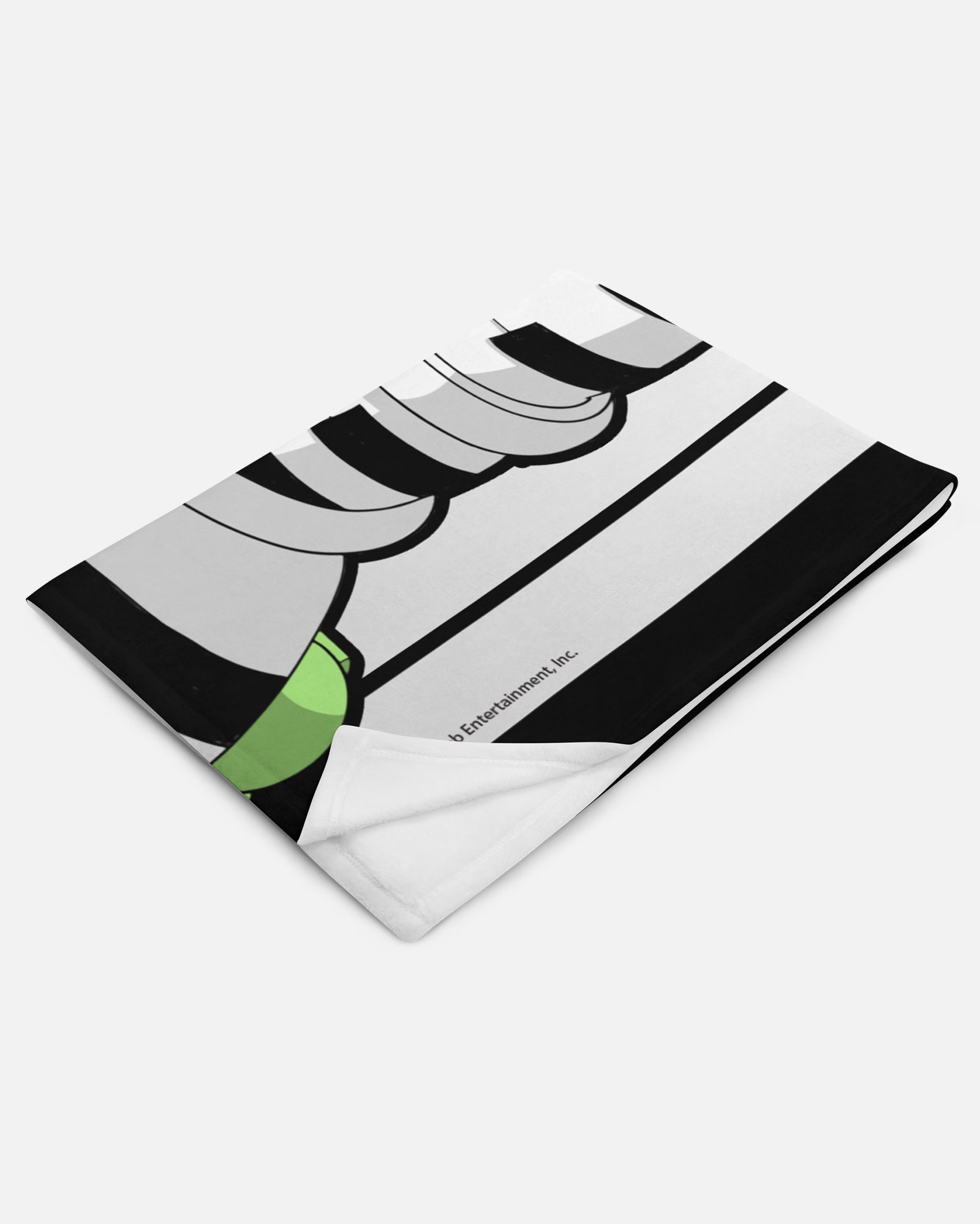 pianosaurus piano keys throw blanket folded up.