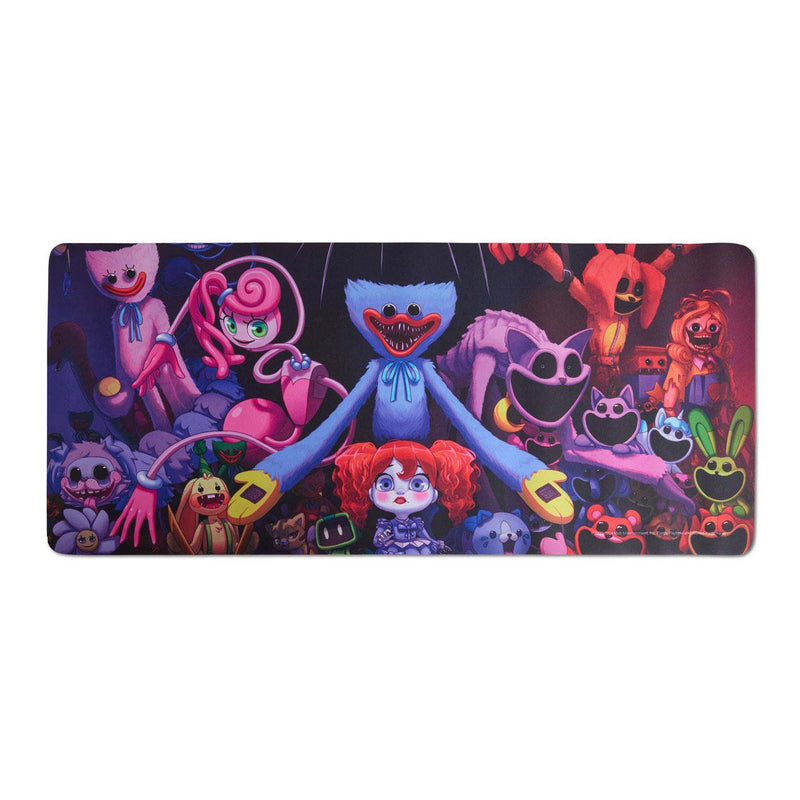 Desk Mat with Poppy Playtime characters gathered around Huggy Wuggy in the center, with other toy characters including Mommy Long Legs, CatNap, and Smiling Critters shown in a dark, neon-lit toy factory setting. The image uses vibrant pink, blue, purple, and red tones with a playful yet spooky atmosphere.