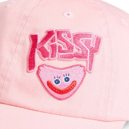 close up shot of embroidered Kissy text and smiling kissy missy face.