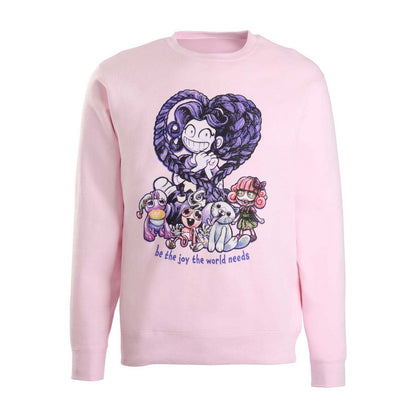 A light pink crewneck sweatshirt featuring a colorful graphic print of a cartoon character and several small characters below, with the text 'be the joy the world needs' printed underneath.