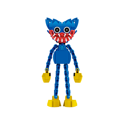 A toy figure resembling Huggy Wuggy, built from interlocking blocks, featuring a blue body, red segmented arms and mouth, yellow hands and feet, and large round eyes.