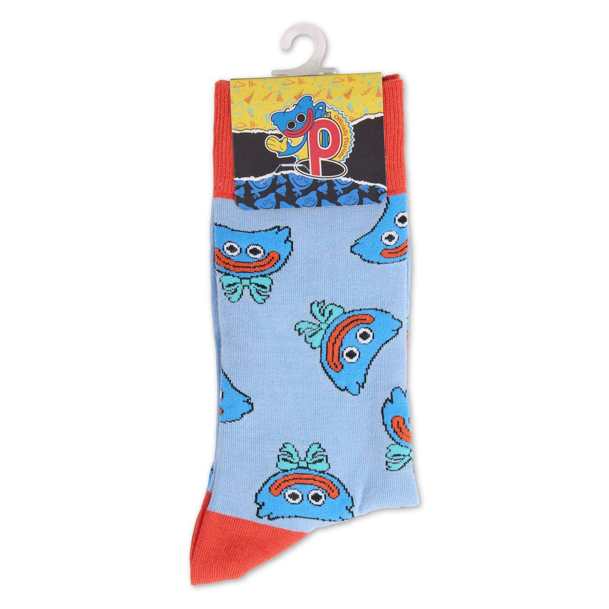 A light blue sock with a repeating pattern of smiling huggy wuggy faces, featuring red toes and heels, hanging from a white plastic hanger.
