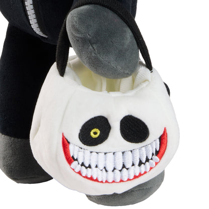 A bucket plush Halloween-style character accessory with a white face, black embroidered eyes and mouth details, stitched teeth outlines.