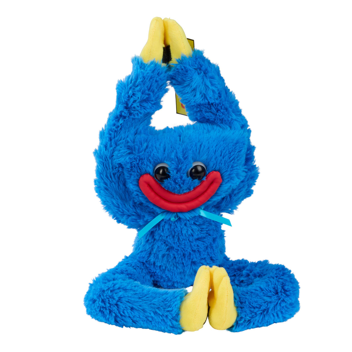 A blue fuzzy plush toy with yellow feet and hands, a red smile, and a light blue ribbon, posed sitting with arms raised.