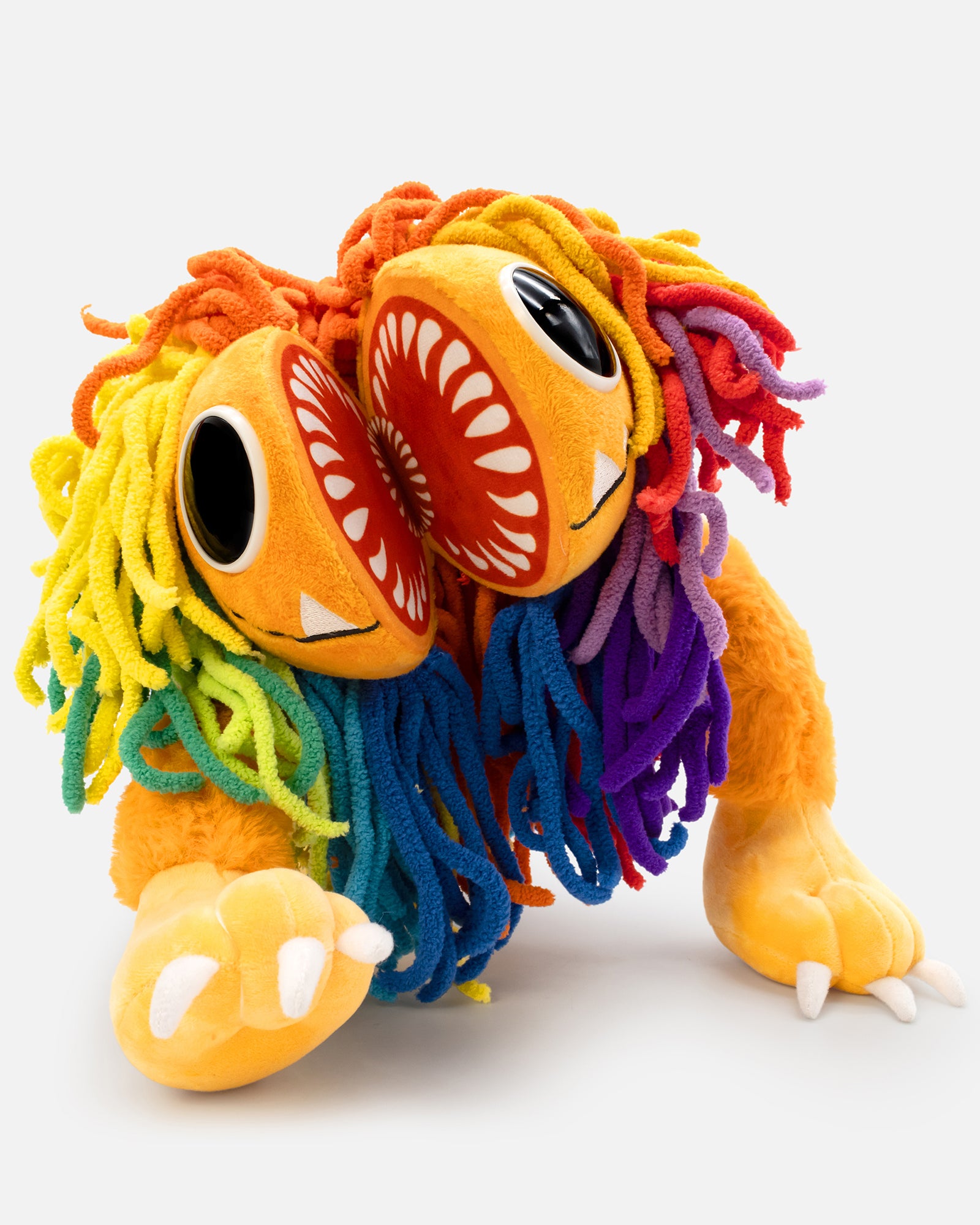 yarnaby plush walking forward with mouth open